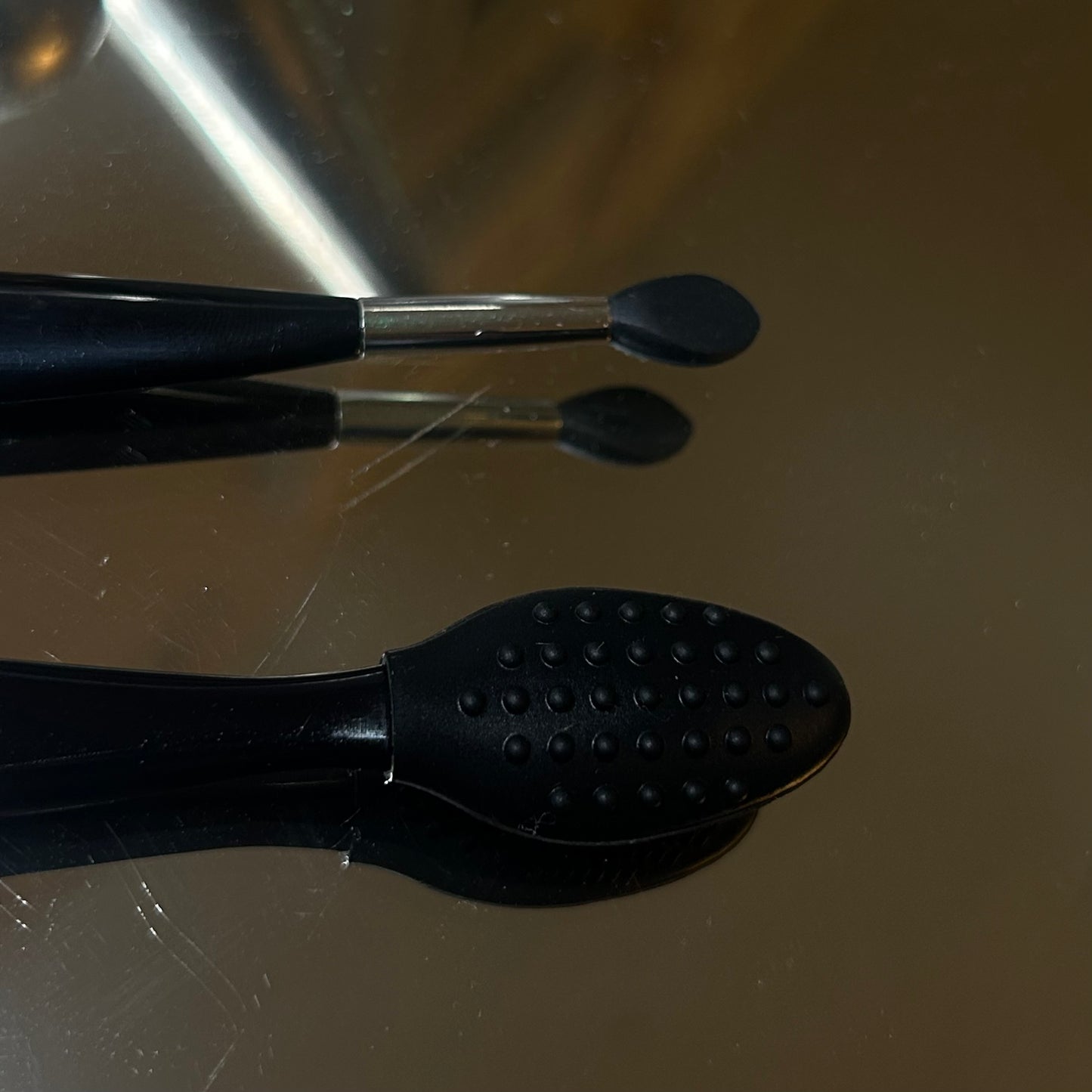 Mini exfoliating brush