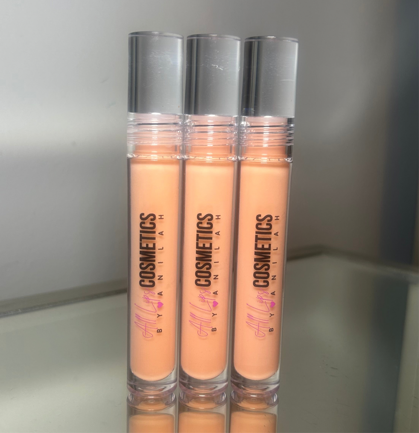 Peachy kisses Lipgloss