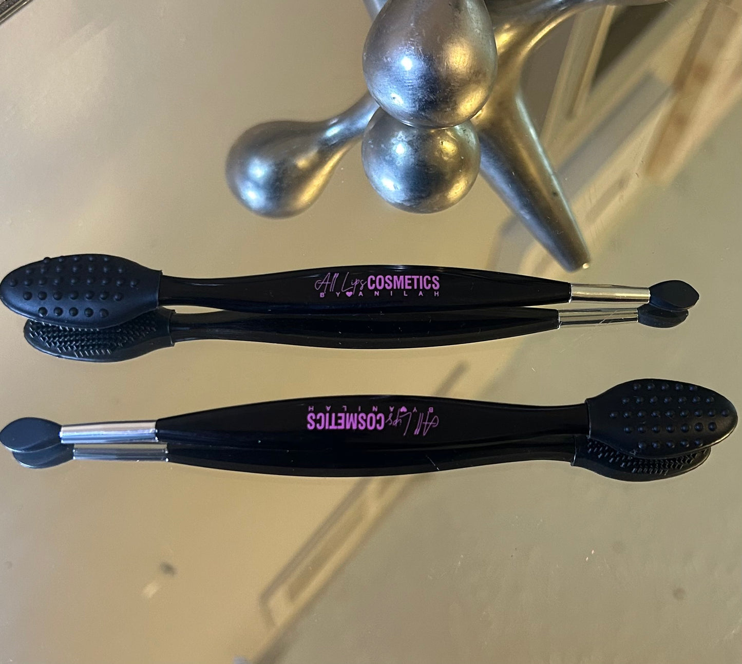 Mini exfoliating brush
